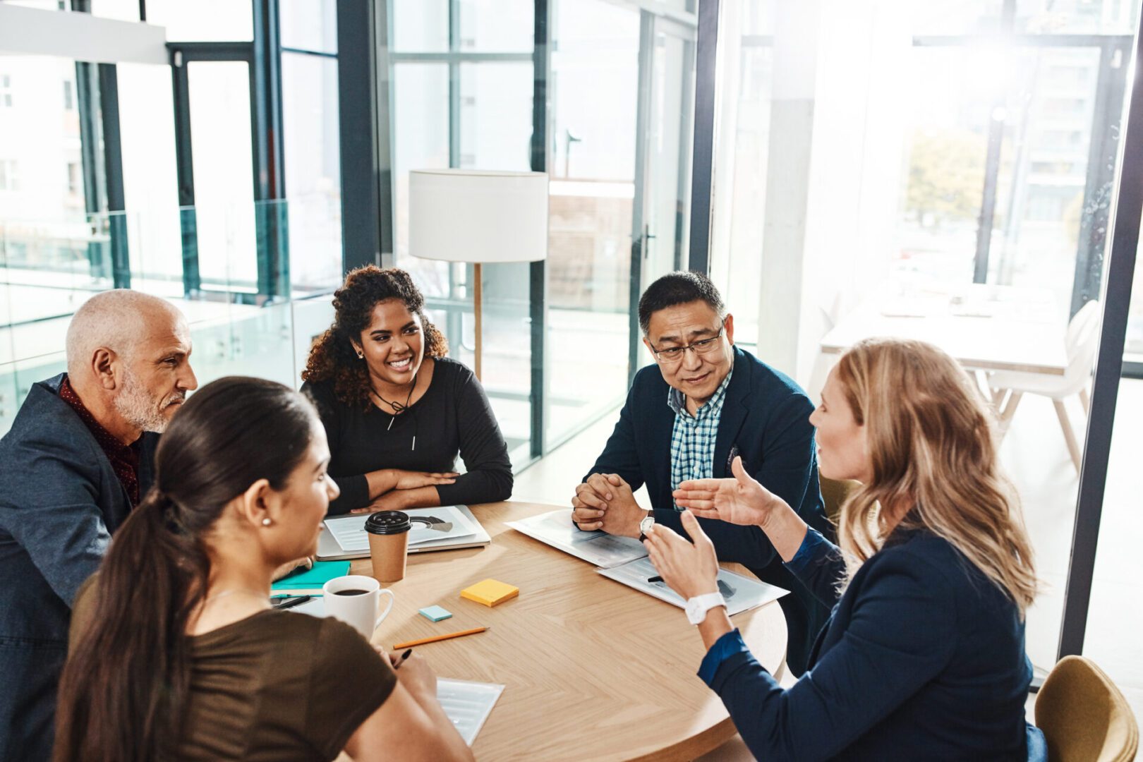 Group collaboration around office table