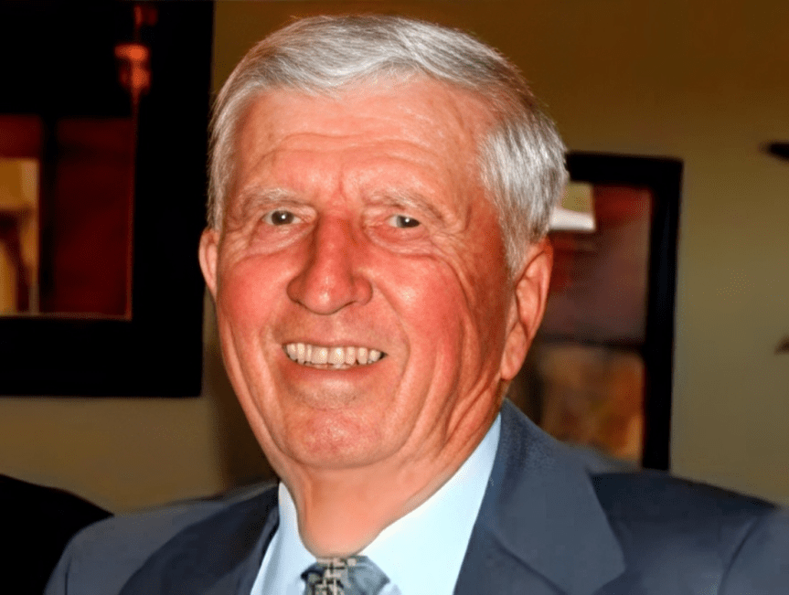 Smiling elderly man in a suit